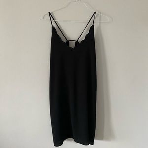 Mango black mini dress size L with open back.